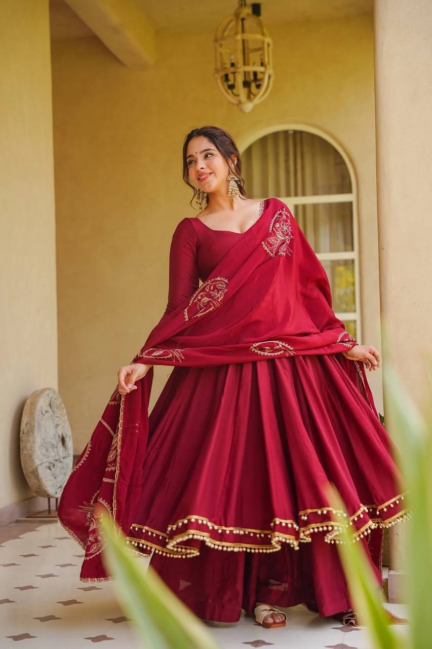 Regal Crimson Red Flared Anarkali Suit Set Adorned with Heritage Gold Motifs and Pearl-Embellished Scalloped Borders